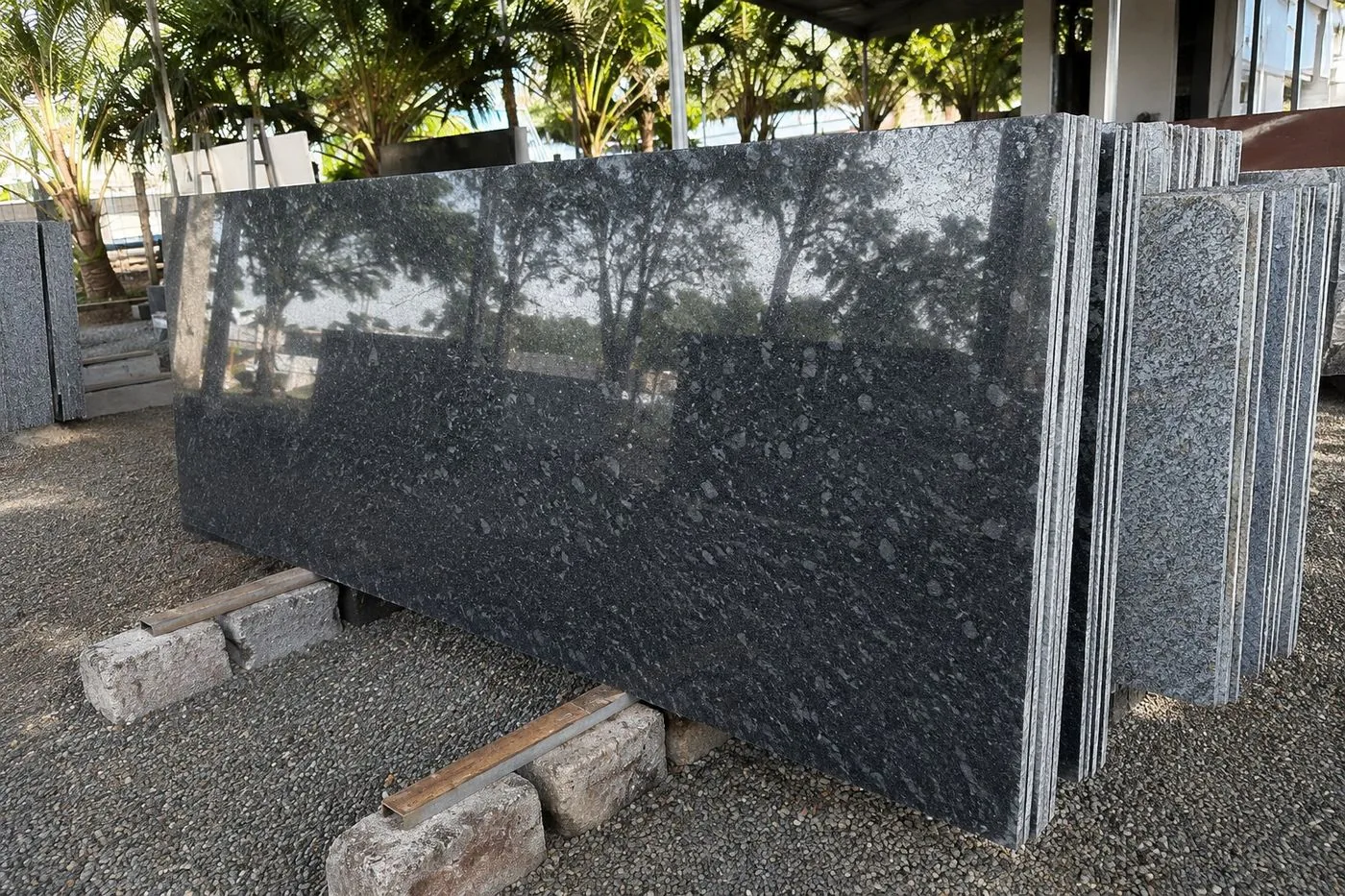 Polished Steel Grey granite slabs at the AMPM yard